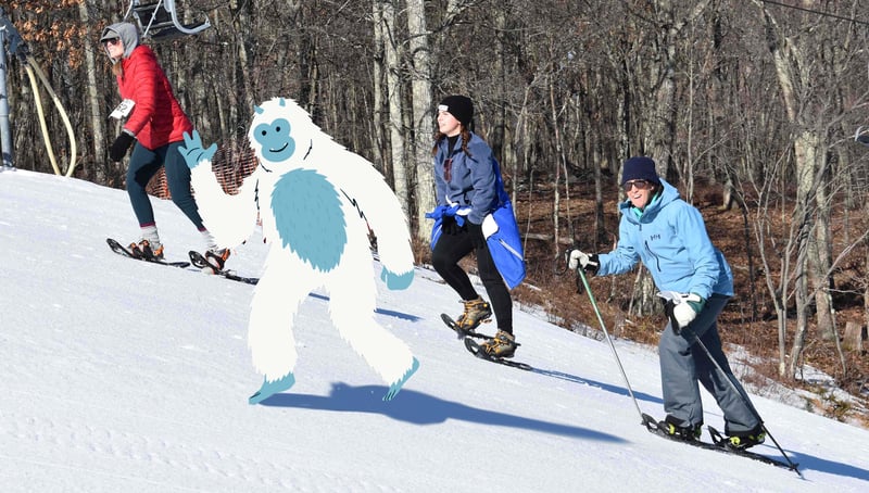 bigfoot header Bigfoot snowshoe race graphic with people walking up the mountain in snow shoes and a yeti clip art