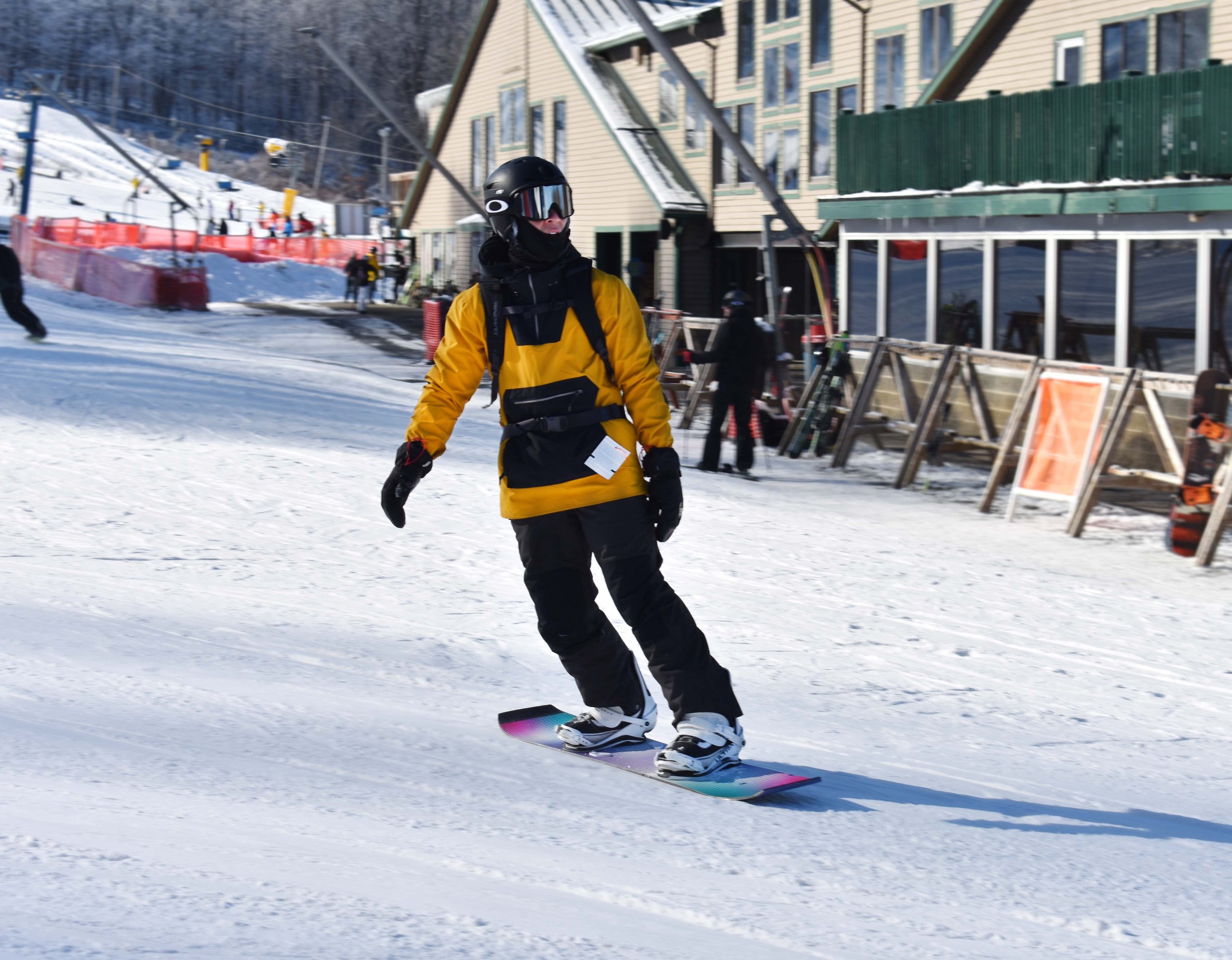 DSC_0078g A snowboarder riding at the bottom of the trail