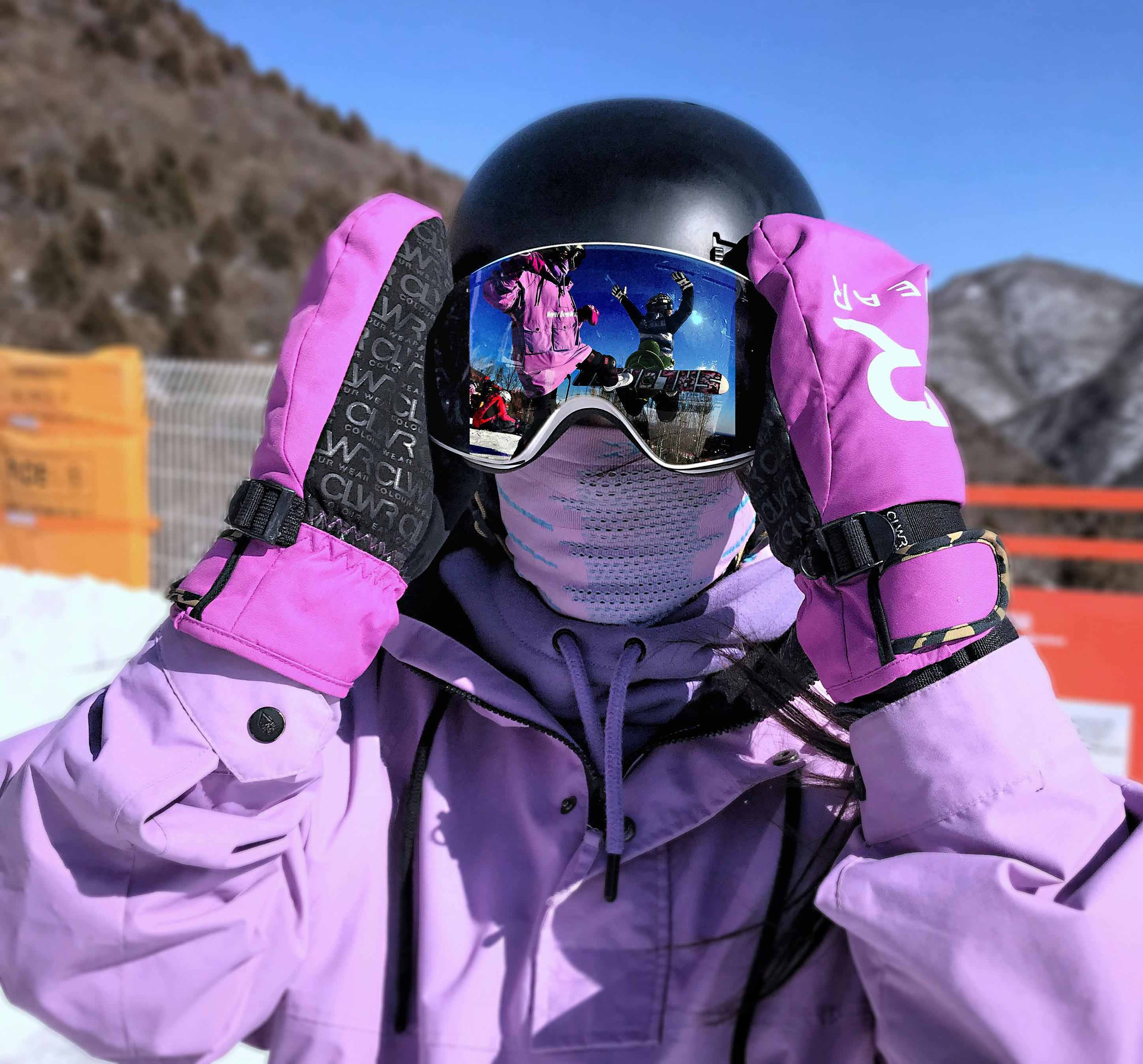 pexels-zszen-2624077 someone wearing purple with goggles and helmet on