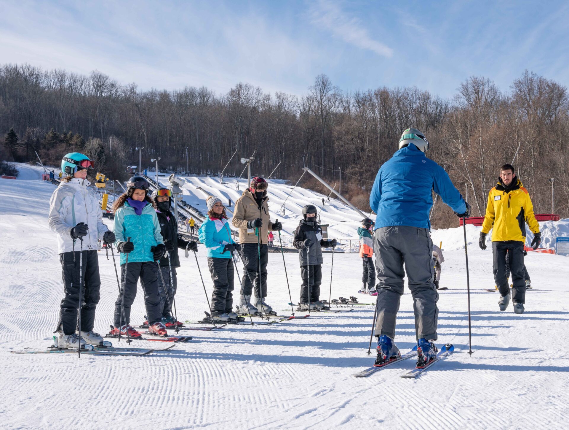 A Shawnee Mountain ski school group learning on snow